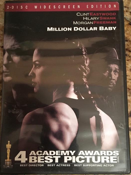 3 DVD’s. - Million Dollar Baby, The Davinci Code, Robin Hood Prince of Thieves display photo