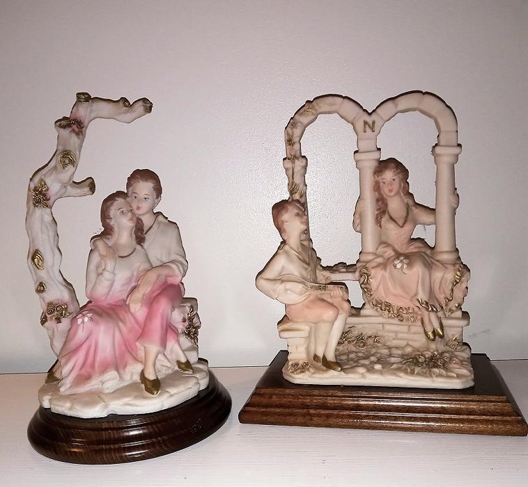 Two Porcelain sculptures on wooden bases $85 ea. display photo